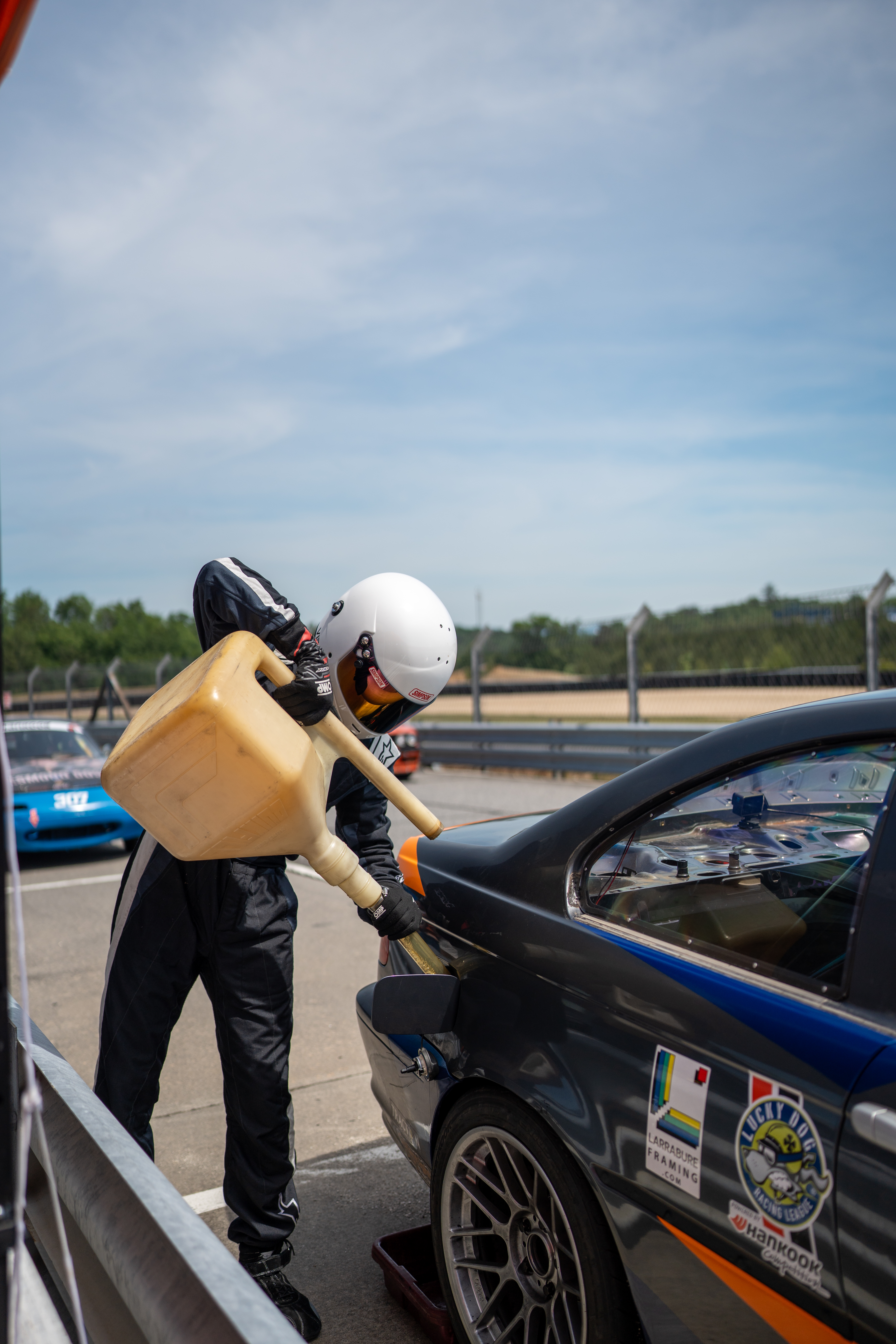 AUA E46 driving on track 3/4ths view of front
