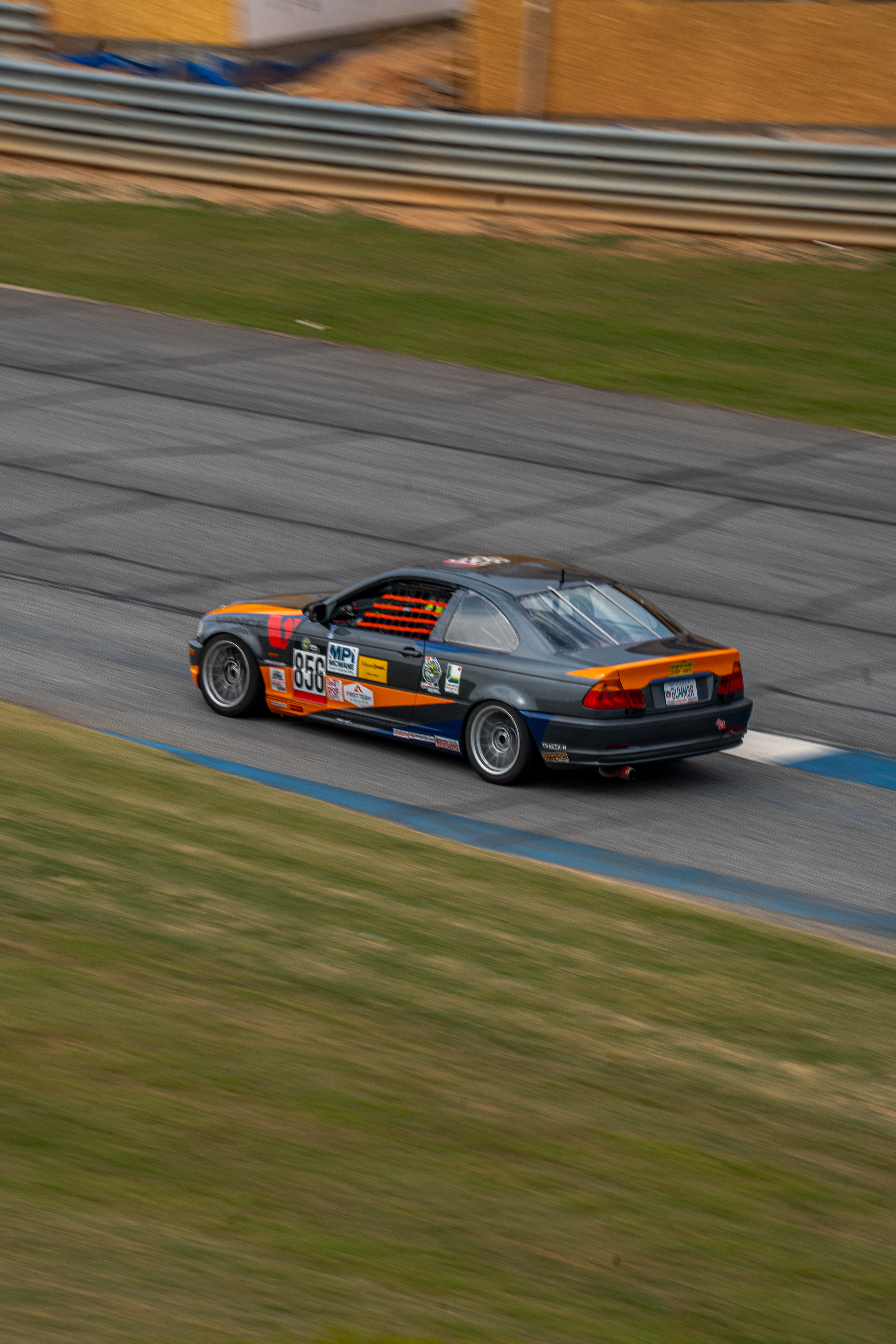 AUA E46 driving on track 3/4ths view of front