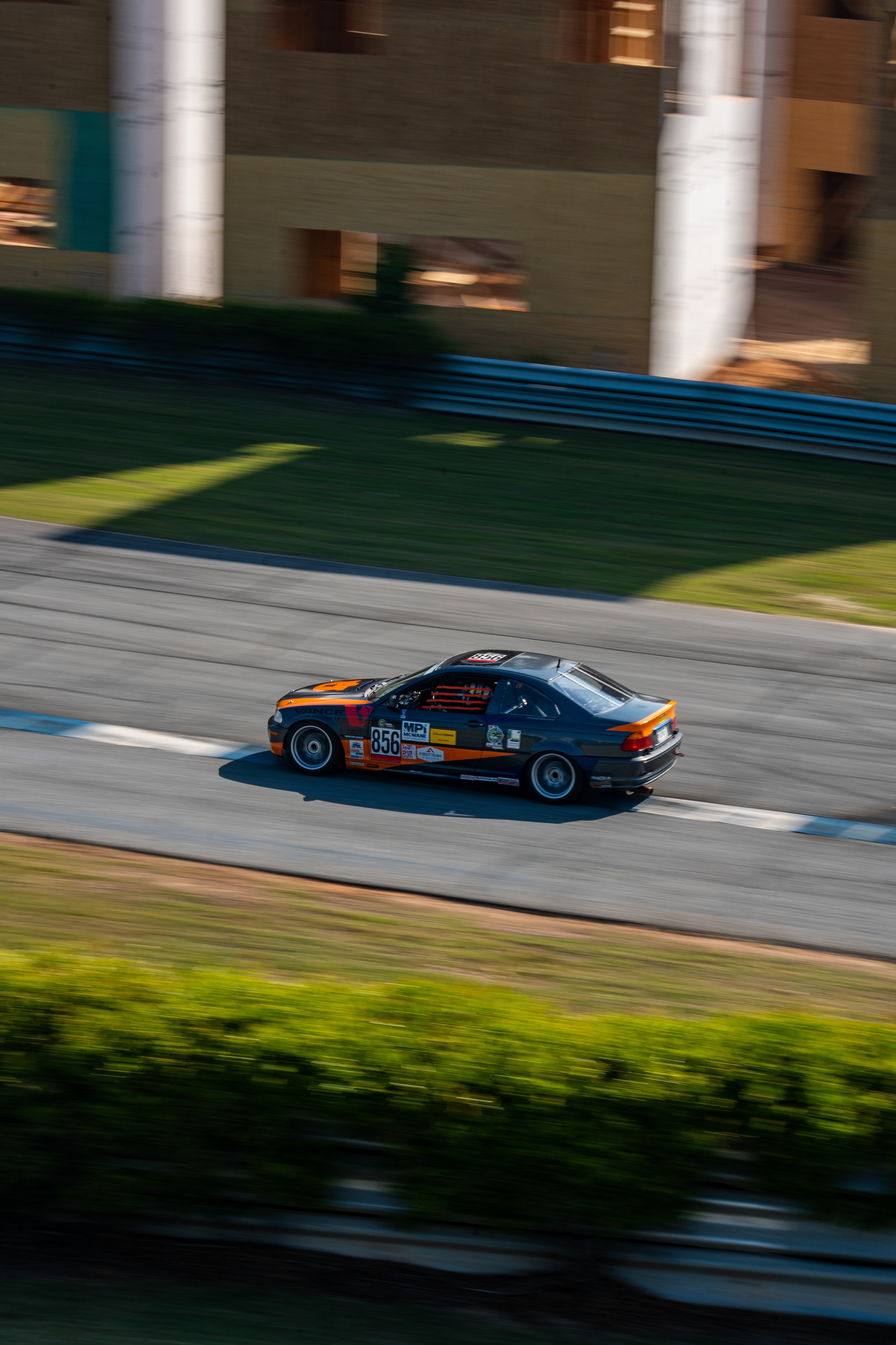 AUA E46 driving on track 3/4ths view of front