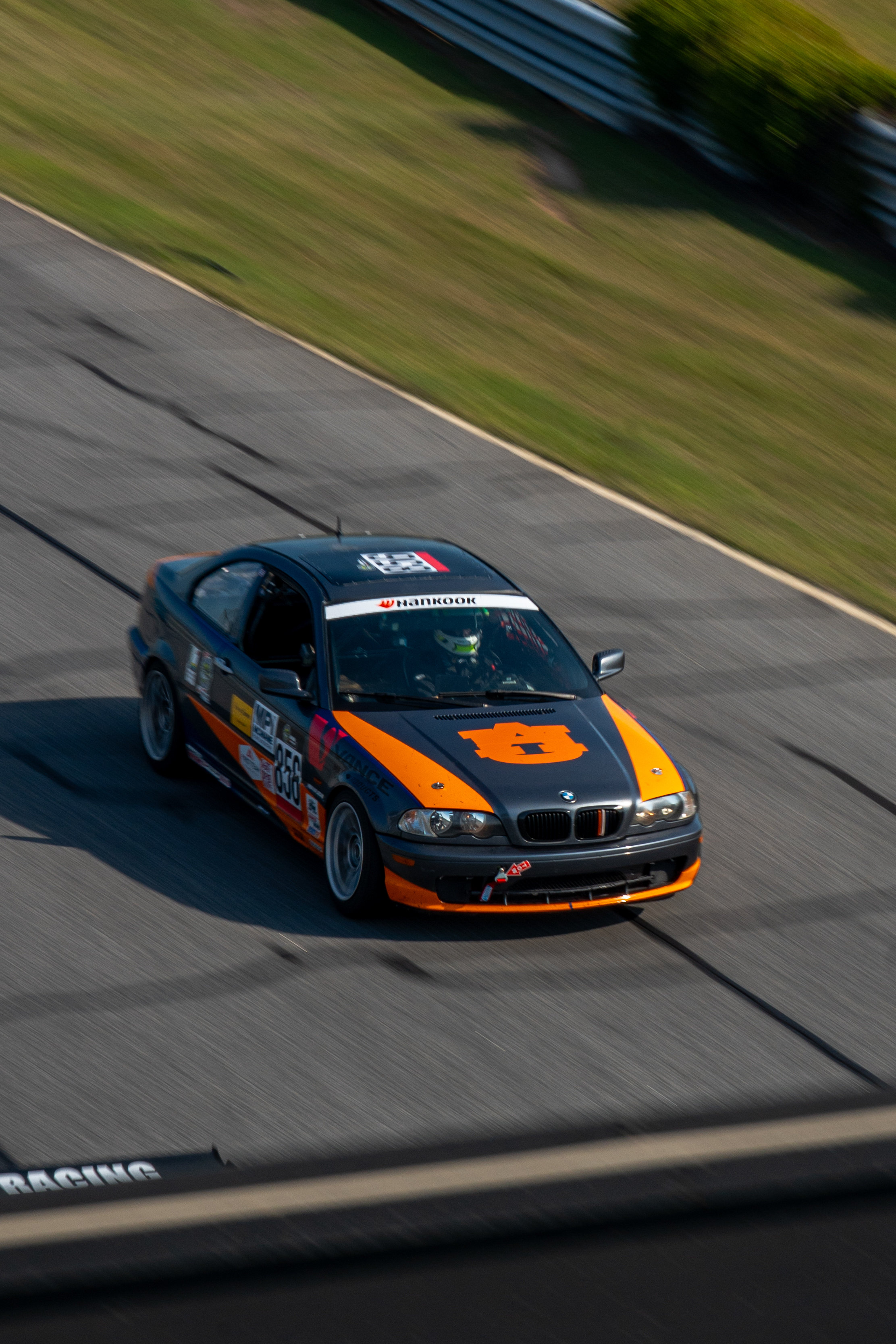 AUA E46 driving on track 3/4ths view of front