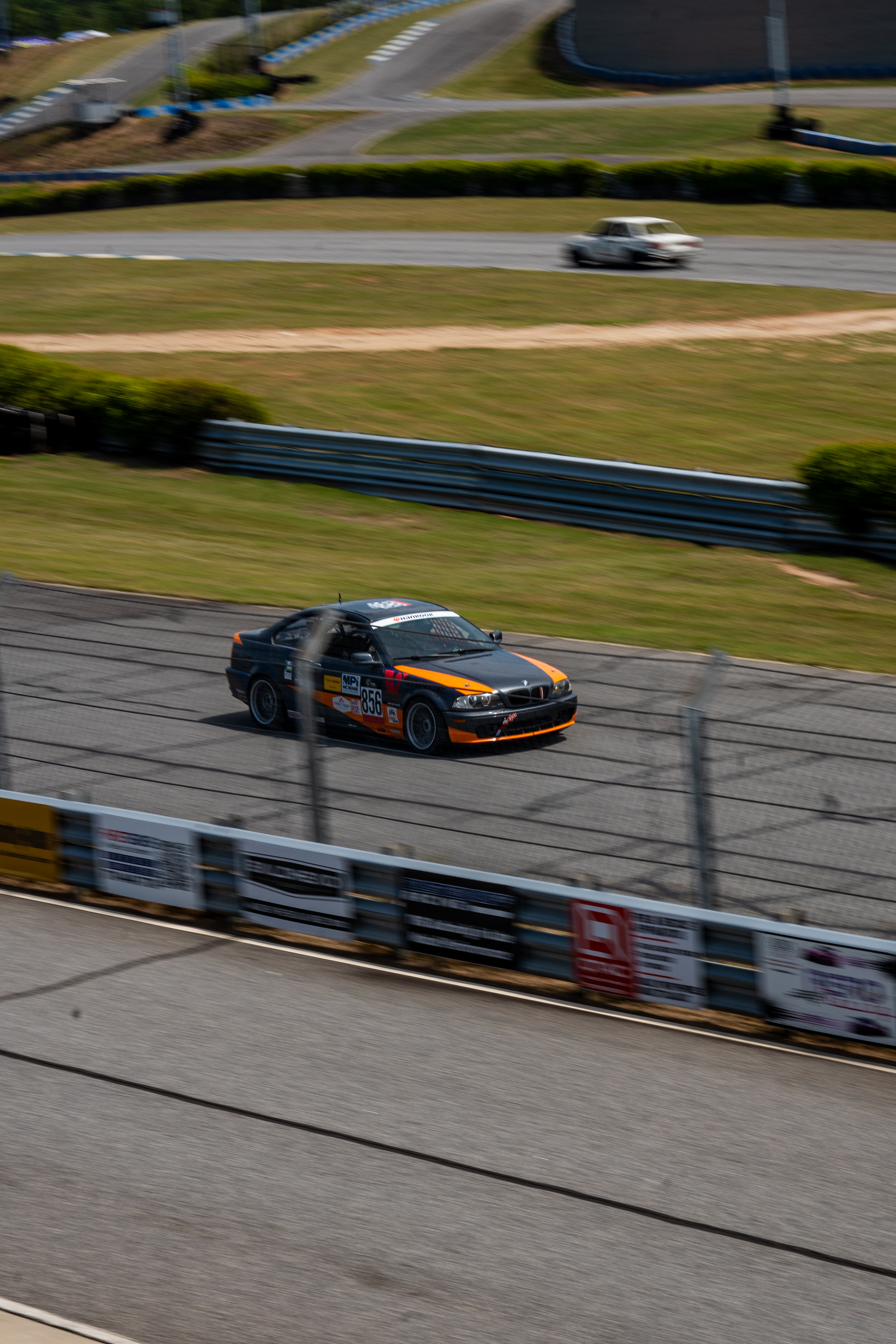 AUA E46 driving on track 3/4ths view of front