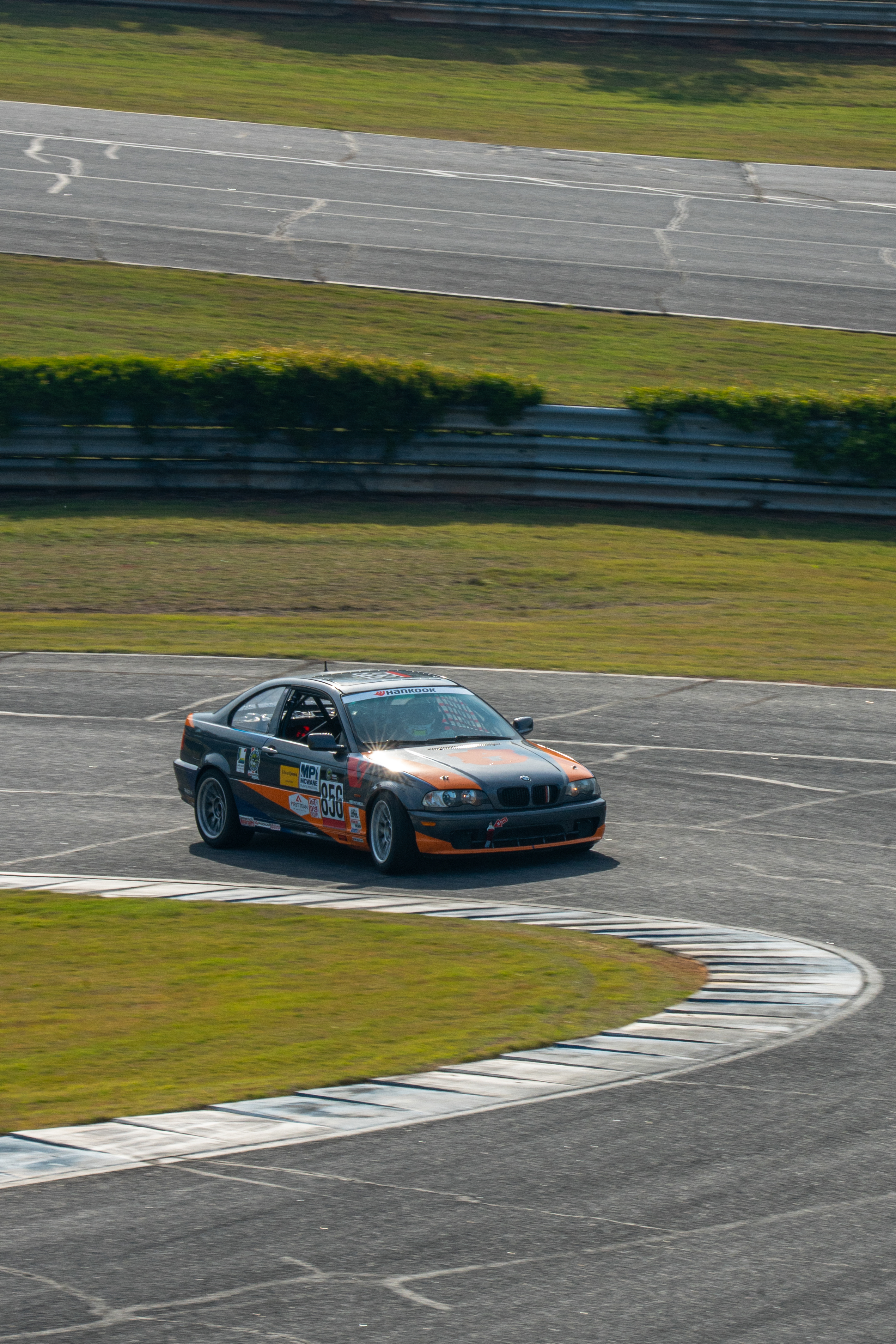 AUA E46 driving on track 3/4ths view of front